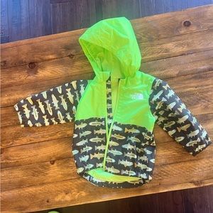 NWOT Infant North Face Rain Jacket. Never been worn. 6-12 months.
